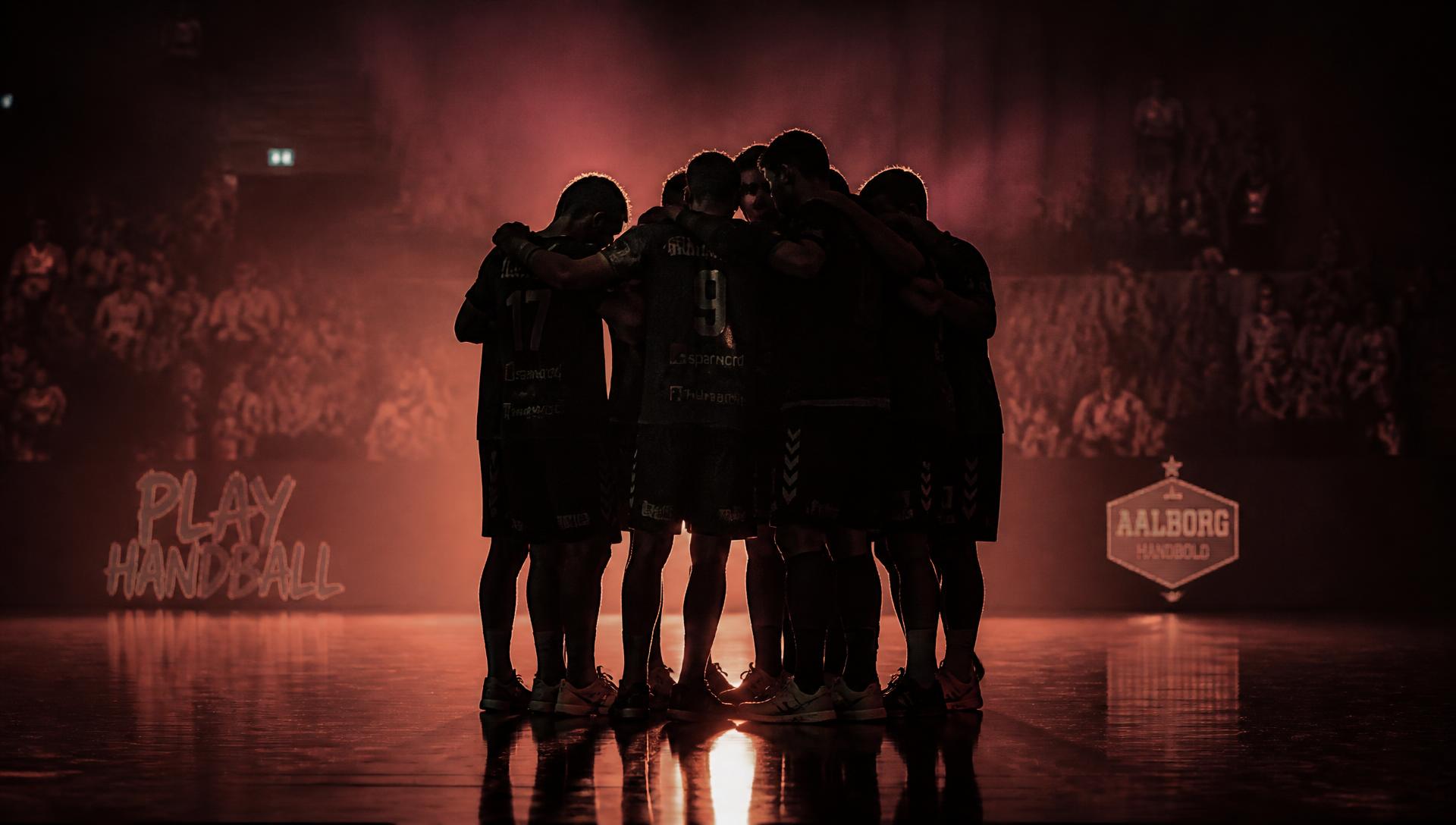 Handball team huddle before a match